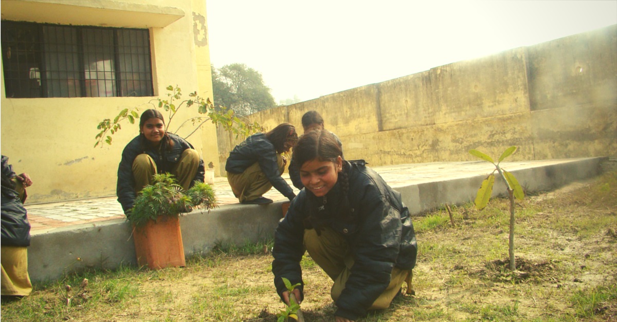 8th grade student making her campus greener