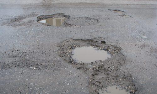 Get a pothole fixed or get paid