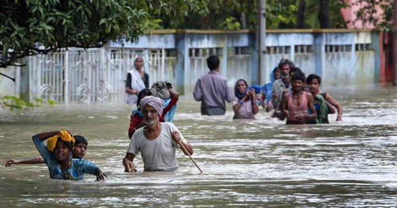 Doctors on bikes helping flood victims