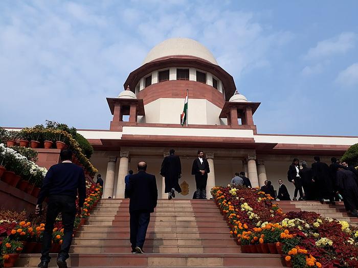 SC suggests Centre put farm laws on hold