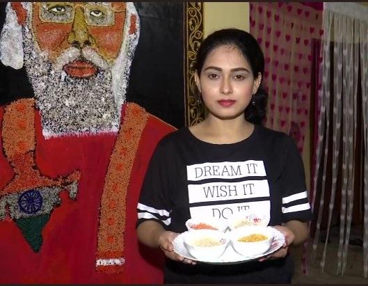 Odisha girl makes a portrait of PM Modi using food grains